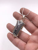 Fordite and Silver Pendant