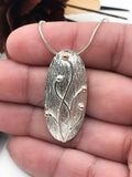 Silver and Gold Pendant
