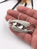 Textured Silver Intertwined Pendant