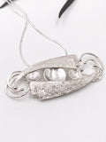 Textured Silver Intertwined Pendant