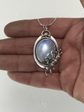 Oval Blue Moonstone and Silver Pendant