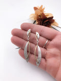Silver and Gold Textured Swoop Dangle Earrings