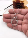 Textured and Polished Silver Wire Pendant