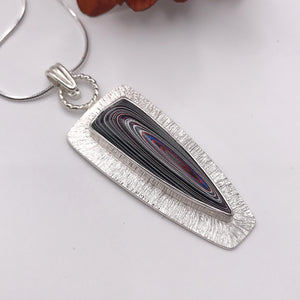 Fordite and Textured Silver Pendant