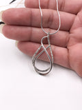 Textured and Polished Silver Wire Pendant