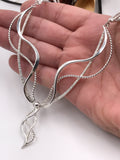 Silver Textured and Intertwined Statement Necklace