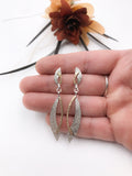 Silver and Gold Textured Swoop Dangle Earrings