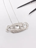 Textured Silver Intertwined Pendant